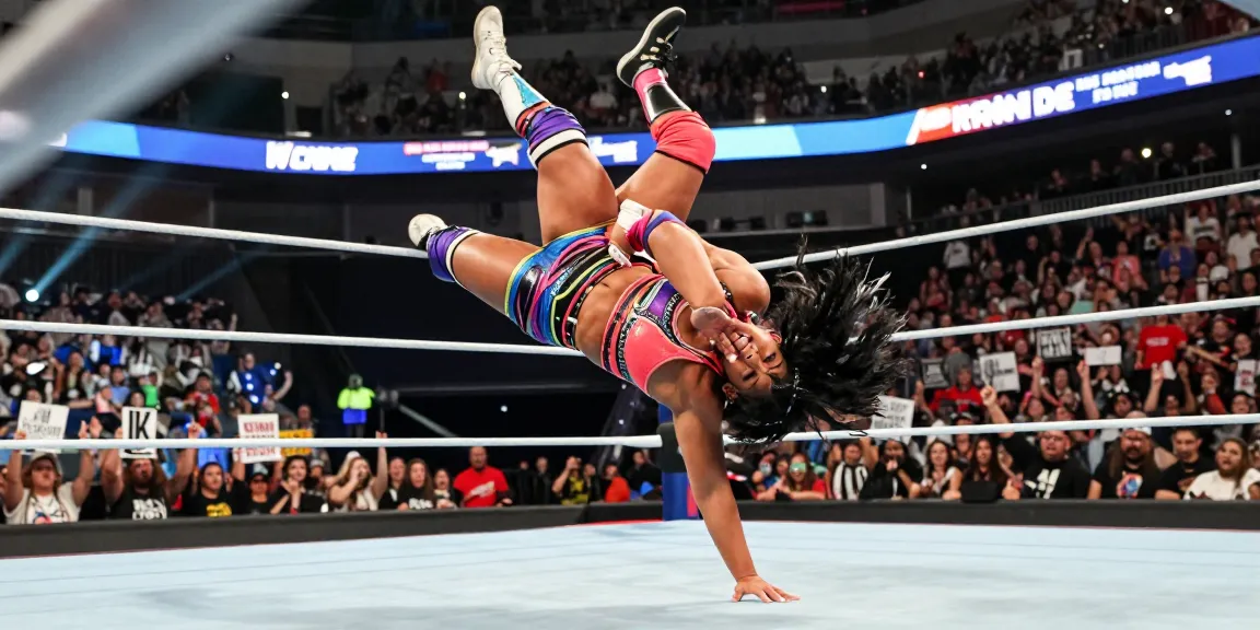 Roxanne Perez executing a high-flying wrestling move in an electrifying wrestling match.